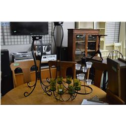 Selection of decor style candleholders including two large candle sticks and two votive holders