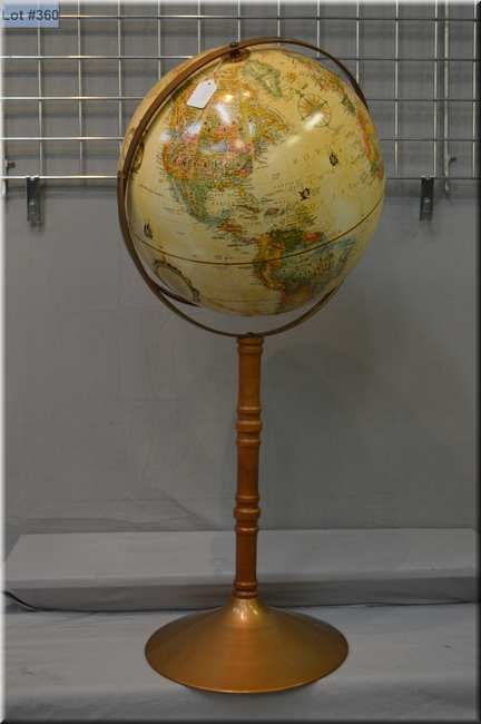 A World Globe And Floor Stand