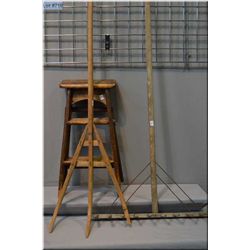 Selection of primitives including rake, fork and a wooden step stool