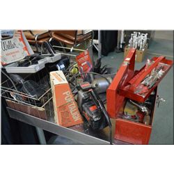 A basket of tools including belt sander, drill, jigsaw, soldering gun etc. and a metal tool box of d