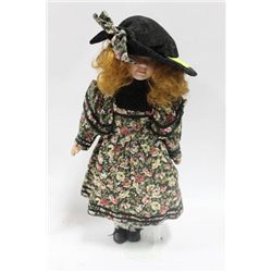 PORCELAIN DOLL ON STAND