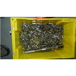 large tub of sockets and wrench