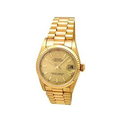 31mm Midsize Rolex 18k Yellow Gold Oyster Perpetual Datejust Watch. Champagne Dial. 18k Yellow Gold 