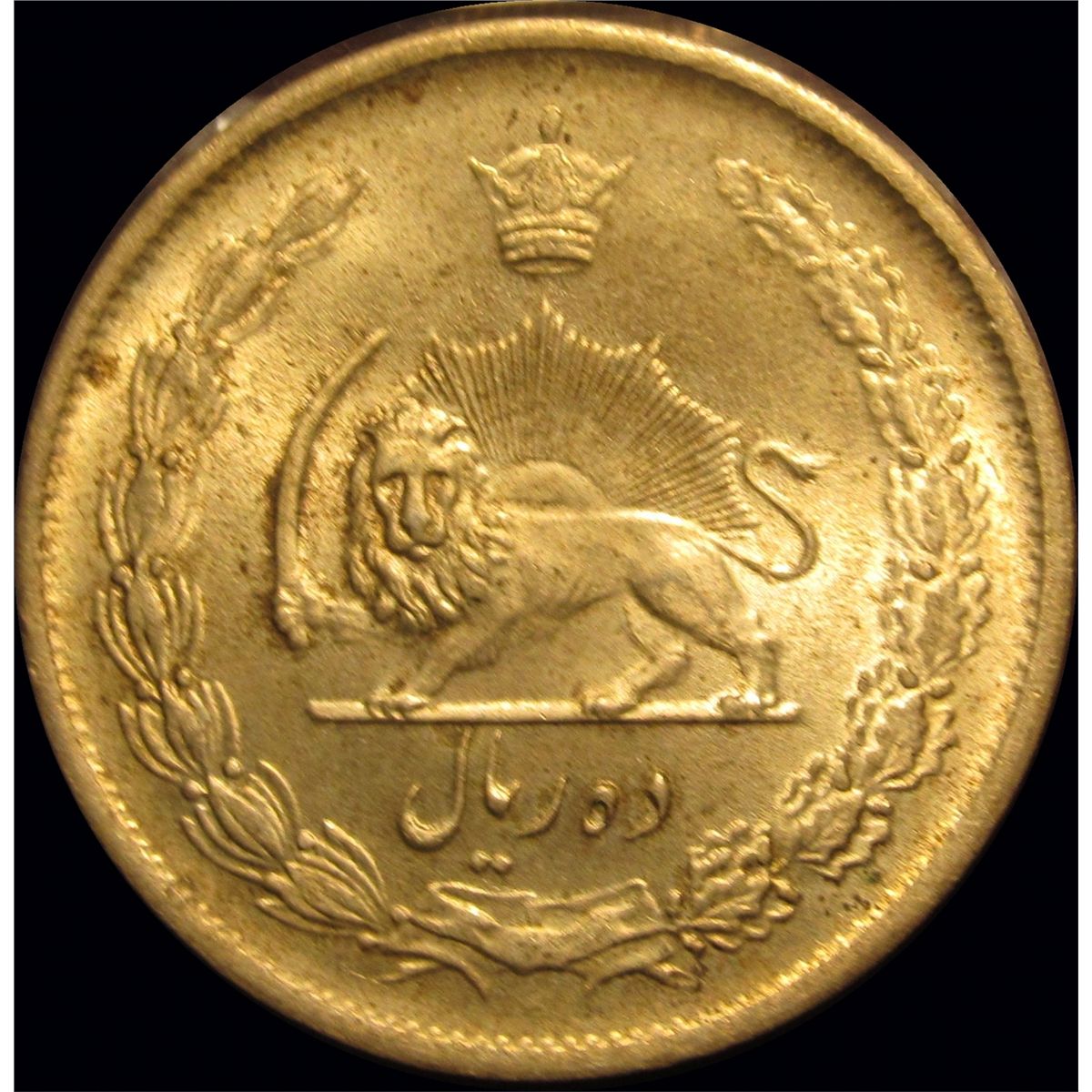 44. SH 1323 Iran Silver 10 Rials. KM # 1146. Radiant Lion holding Sword ...
