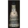 Image 1 : Buck Bit's;  Flask containing the First Bank Notes processed through the New facilities and Mechaniz