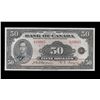 Image 1 : 1935 $50 BC-13 #A29065, PMG CCCS UNC65.  Great colours and centering.  Seldom seen better.  Extremel