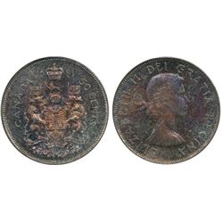 1961 50¢ PCGS MS66.  Superb red and blue tones.