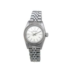 Lady's Rolex Stainless Steel Oyster Perpetual Watch. Silver Dial. 18k White Gold Fluted Bezel. Stain