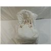 Image 1 : SMALL PORCELAIN BABY DOLL IN WICKER CRADLE