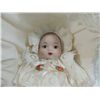 Image 3 : SMALL PORCELAIN BABY DOLL IN WICKER CRADLE