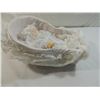 Image 2 : SMALL PORCELAIN MUSIC BOX BABY DOLL IN WICKER CRAD