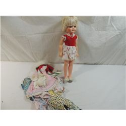 VINTAGE DOLL WITH DIFFERENT OUTFITS