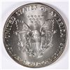 Image 2 : 1986 AMERICAN SILVER EAGLE, RAINBOW TONING ON THE OBVERSE