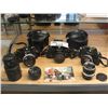 Image 1 : 3 NIKON EM 35MM FILM CAMERAS COMPLETE WITH 6 NIKON LENSES, 2 CAMERA CASES AND 1 FLASH