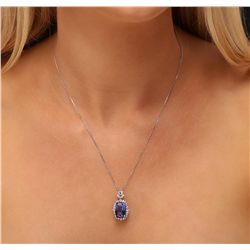 14KT White Gold 6.63ct Tanzanite and Diamond Pendant With Chain