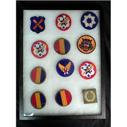 COLLECTION OF 12 WWII PATCHES IN RIKER MOUNT CASE