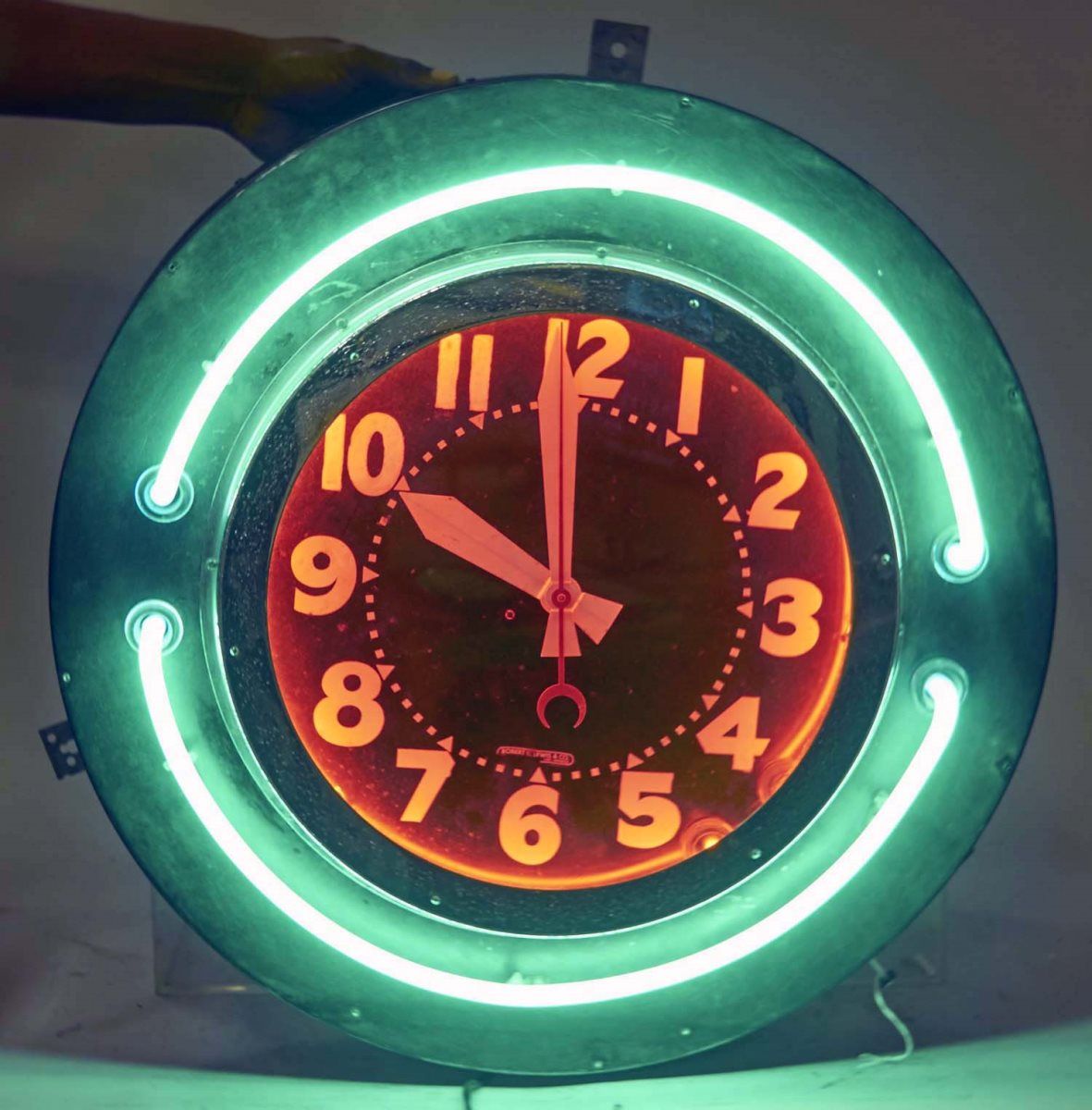 Robert K. Lewis & Co. Round Neon Wall Clock