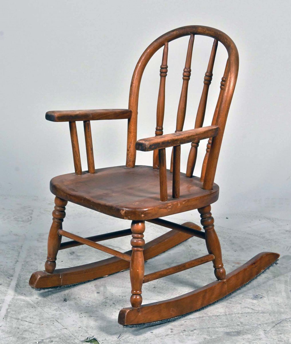 small child's wooden rocking chair