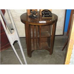 EARLY 1900S OAK TABLE WITH REVOLVING BOOKCASE