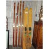 Image 1 : GROUP LOT OF VINTAGE SKIIS; CROSS COUNTRY AND WATER SKIIS, PAIR OF SNOW SHOES AND A WOODEN PADDLE
