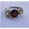Image 1 : 2.110g Ring of Peridot And Garnet Made in 925 Silver