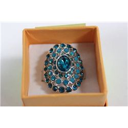 STERLING SILVER RING W / BRIGHT BLUE STONES