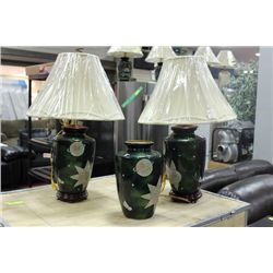 PAIR OF GREEN SUN AND MOON PORCELAIN LAMPS