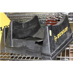 PAIR OF PLASTIC DUNLOP TIRE STANDS