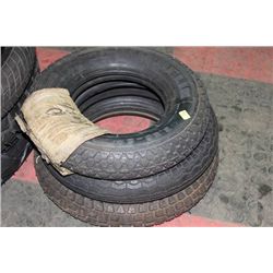 STACK OF 3 SMALL MOTORCYCLE TIRES SOLD TOGETHER
