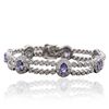 Image 1 : 14KT White Gold 5.81ctw Tanzanite and Diamond Bracelet