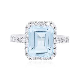 14KT White Gold 5.46ct Topaz and Diamond Ring