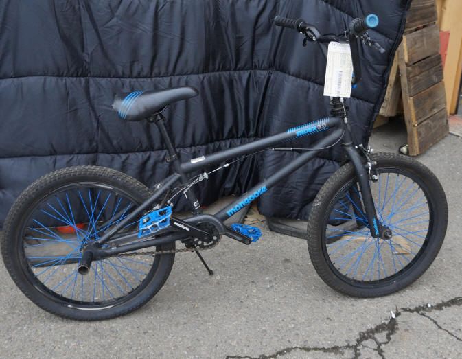 black and blue mongoose bike