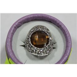 STERLING SILVER RING W / BROWN HUED STONE