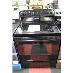 BLACK GE CERAMIC TOP OVEN NO SHELVES MSRP 949.00