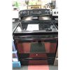 Image 1 : BLACK GE CERAMIC TOP OVEN NO SHELVES MSRP 949.00