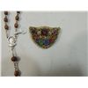 Image 2 : WOODEN ROSARY AND DECORATIVE BROOCH