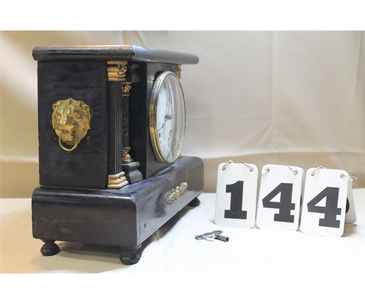 Waterbury Clock Co. Black Mantel Clock w/4 Columns & Brass Lion Heads