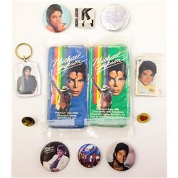 MICHAEL JACKSON ASSORTMENT OF MEMORABILIA BUTTONS AND CHOCOLATE BARS