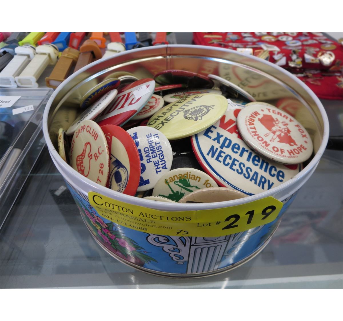Tin of collector pin back buttons