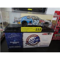 Scale model Kevin Harvick stock car in clear case