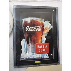 Framed Coca-Cola poster