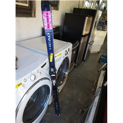 Pair of snow skis with bindings