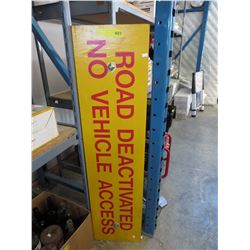 Wood road sign