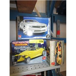 3 Ertl model kits.