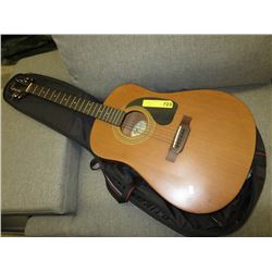 Acoustic guitar with case