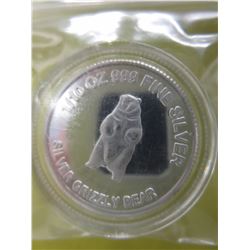 .999 Silver Canadian Grizzly bear coin in capsule