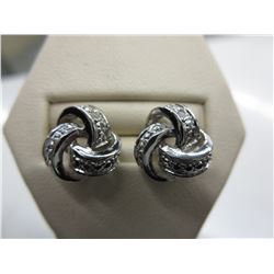 Brand new Diamond twist earrings