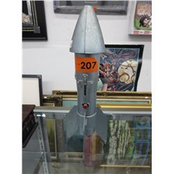 Metal rocket bank by Astro
