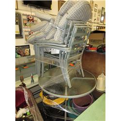 Skid of patio furniture and large ceramic pots