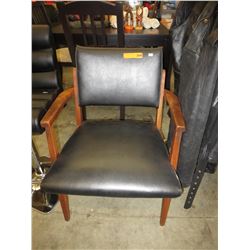 Mid century modern chair with teak arms